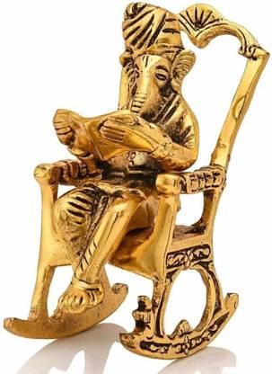 Golden Lord Ganesha Statue Sitting On A Rocking Chair And Reading Ramayan Showpiece - VAYARA